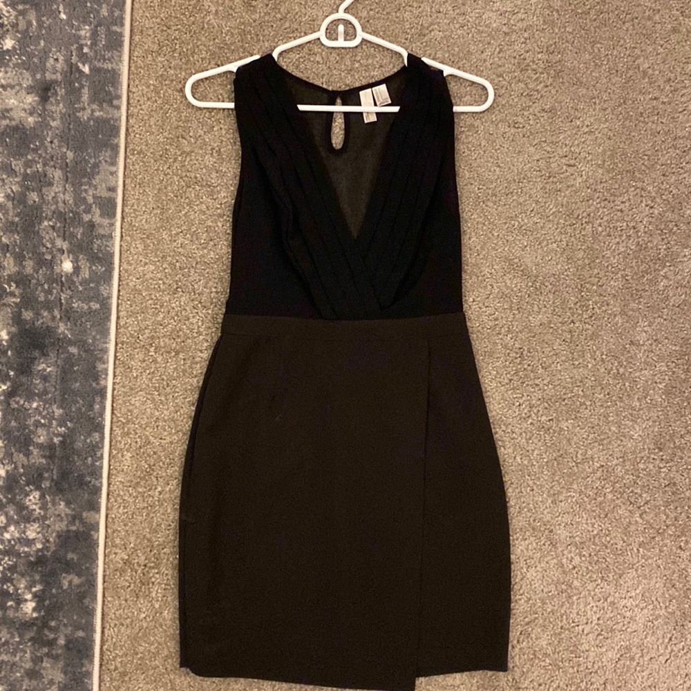 Simple little black dress with a cute see through back!